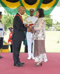 Diana McIntyre Pike receiving the National Order of Distinction Award