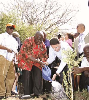 Taleb Rifai and Kenneth Kaunda - Tree Planing at IIPT Peace Park dedication
