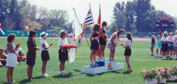 Brenda accepting medal